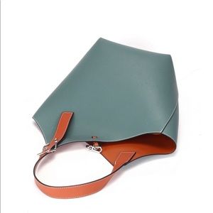 Cholet leather Maison de Beuate bucket bag “Celeste”